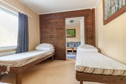 Evon Rantahuvilan 2 hengen makuuhuone.